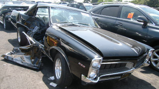 Illustration for article titled 1967 Pontiac LeMans that was victim of brutal Lexus attack turns up at auction
